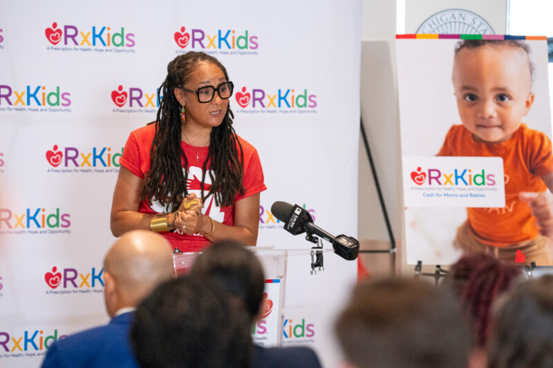Mama Sol delivers her poem at Rx Kids expansion in Genesee County